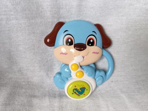 Zenélő kutyás csörgő – angol nyelvű, használt jó állapotú, 12 cm (G1)