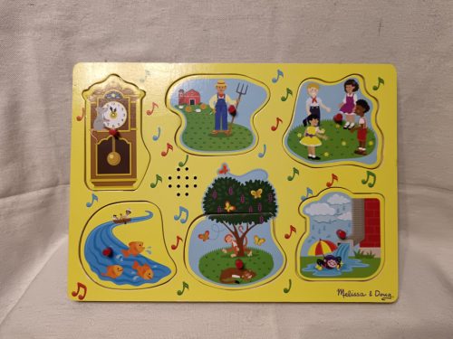 Melissa & Doug zenélő angol nyelvű kirakó – használt, újszerű állapotban (G3)