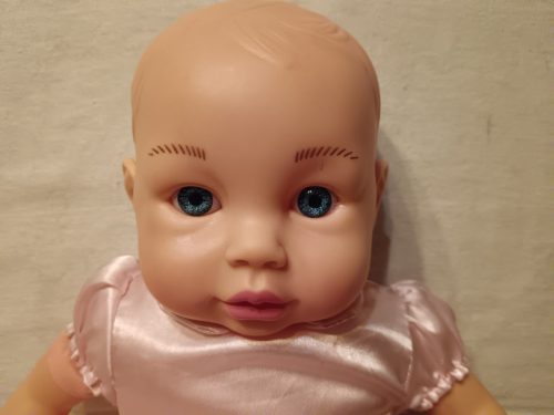 Puhatestű játékbaba rózsaszín ruhában használt, jó állapotú– 43 cm (G3) 