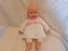 ASDA játékbaba babában, 34 cm – használt állapotban (B2)