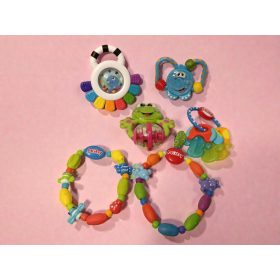   Csörgő és rágóka fejlesztő csomag babáknak – használt, jó állapotban (B2)