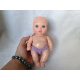 Játékbaba lila bugyiban – újszerű állapotú, 19 cm (G1) 