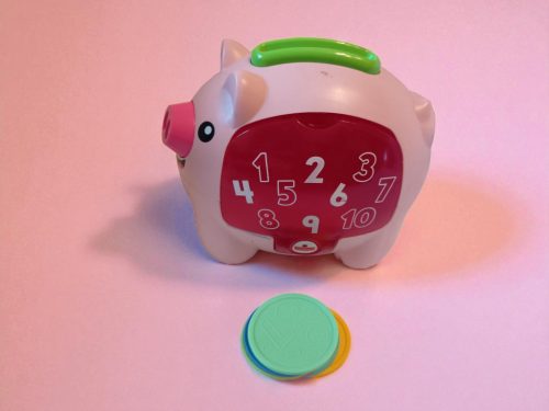 Fisher-Price Tanuló Malacpersely, zenélő és számoló játék – használtabb állapotban (G2) 